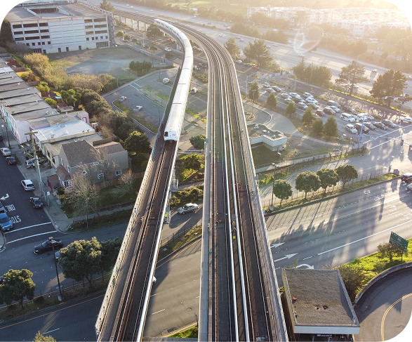 An aerial view of a subway train in action.