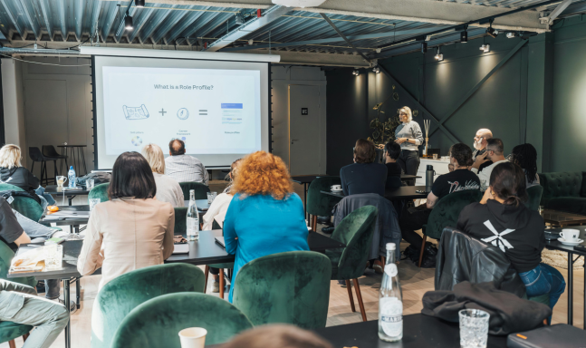 9 A man pointing at a machine