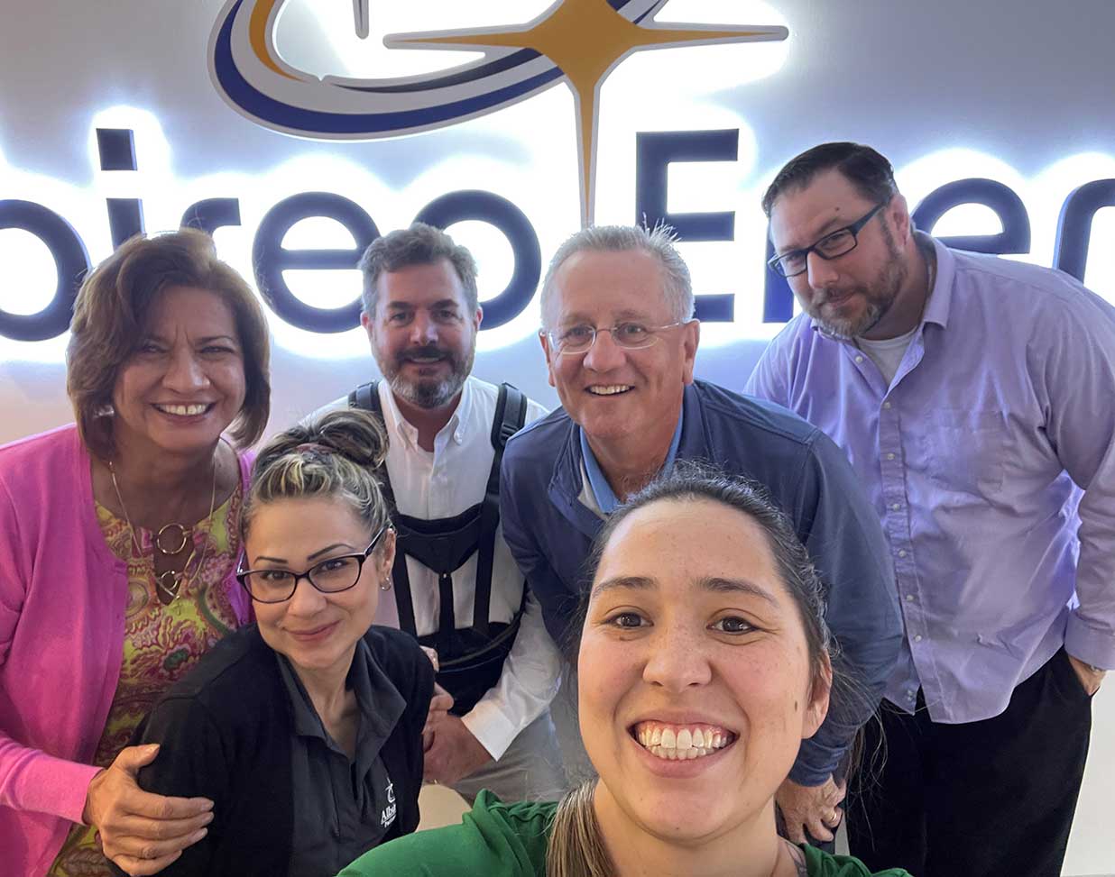 Albireo Energy employee in front of a work truck.